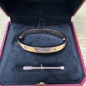 Cartier wide four-diamond classic Love bracelet, rose gold, size 17.